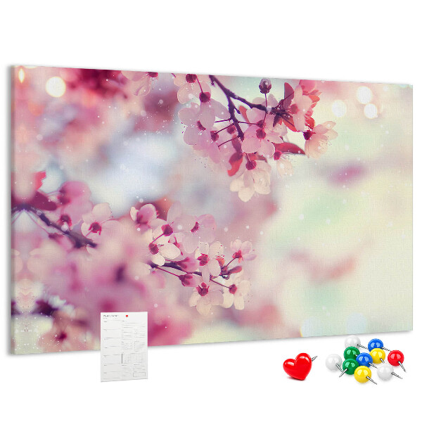 Pizarra de corcho con diseño de ramas florales en tonos pastel