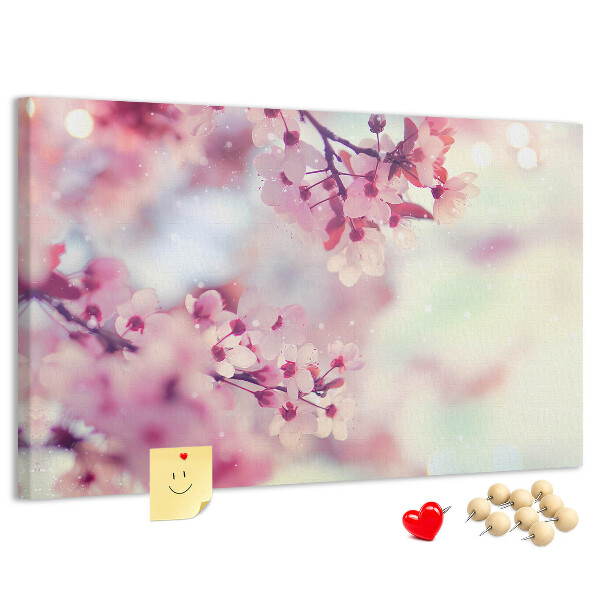Pizarra de corcho con diseño de ramas florales en tonos pastel