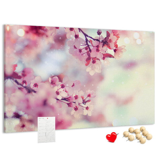 Pizarra de corcho con diseño de ramas florales en tonos pastel