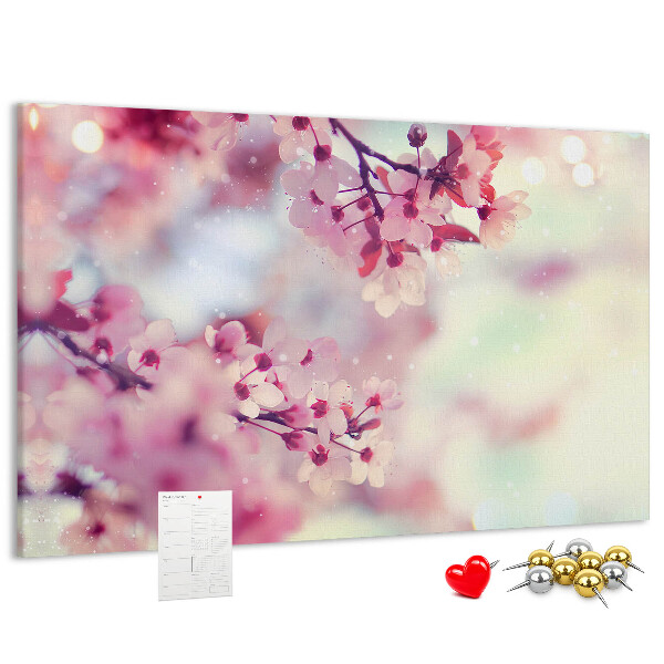 Pizarra de corcho con diseño de ramas florales en tonos pastel