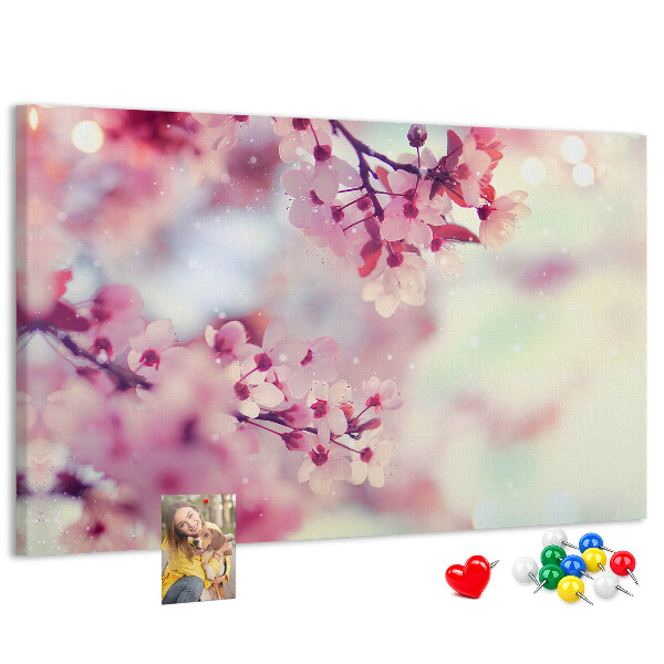 Pizarra de corcho con diseño de ramas florales en tonos pastel