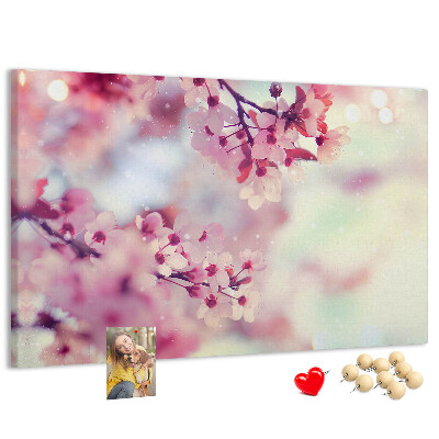 Pizarra de corcho con diseño de ramas florales en tonos pastel