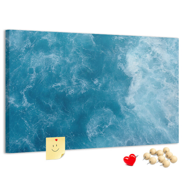Pizarra de corcho con diseño inspirado en el azul profundo de las olas del mar y la espuma