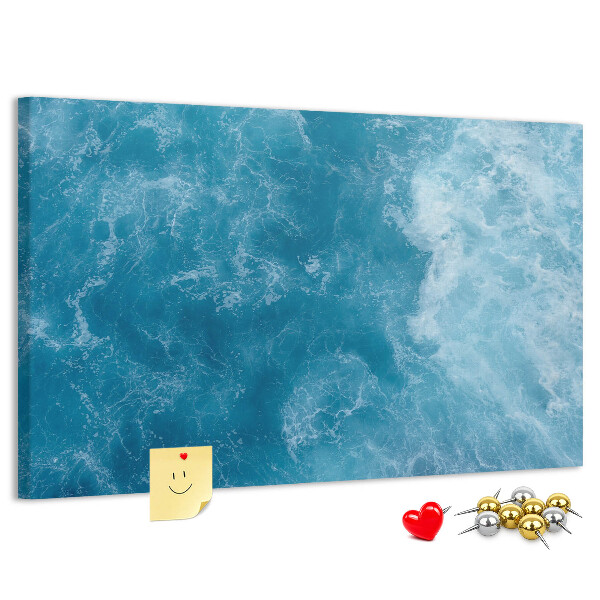 Pizarra de corcho con diseño inspirado en el azul profundo de las olas del mar y la espuma