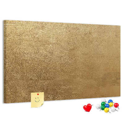Tablero de anuncios con textura dorada y diseño minimalista