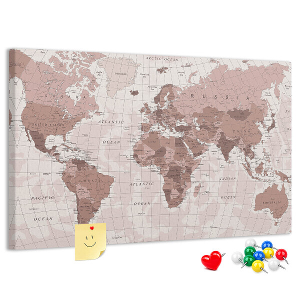 Tablero de corcho decorado Un mapamundi en tonos rosas.