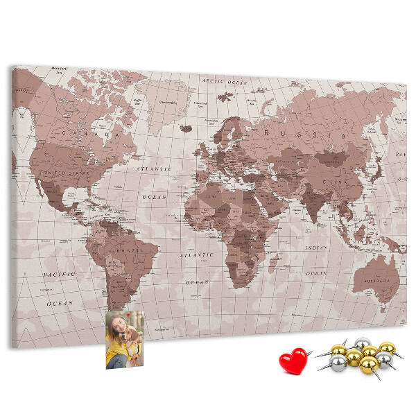 Tablero de corcho decorado Un mapamundi en tonos rosas.