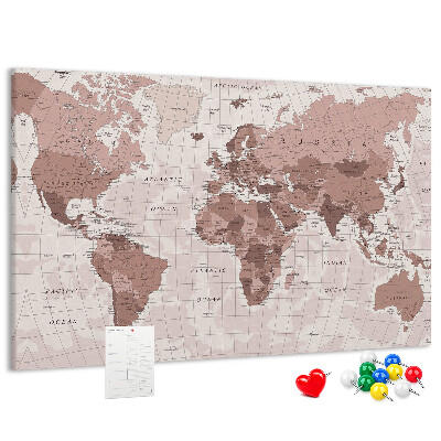 Tablero de corcho decorado Un mapamundi en tonos rosas.