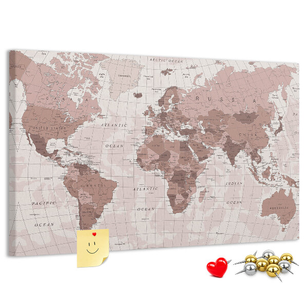Tablero de corcho decorado Un mapamundi en tonos rosas.