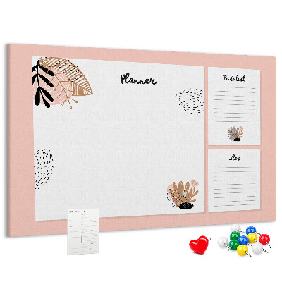 Tablero de corcho decorado con un elegante diseño de detalles florales