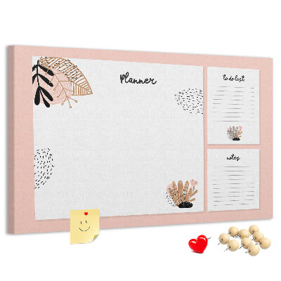 Tablero de corcho decorado con un elegante diseño de detalles florales