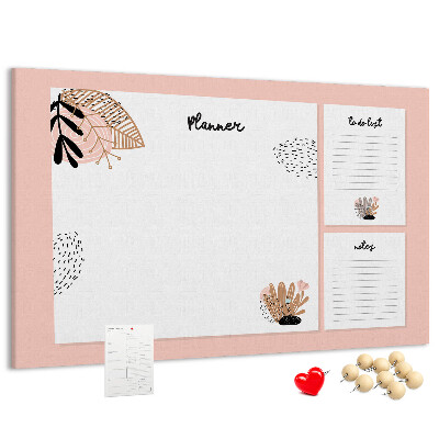 Tablero de corcho decorado con un elegante diseño de detalles florales
