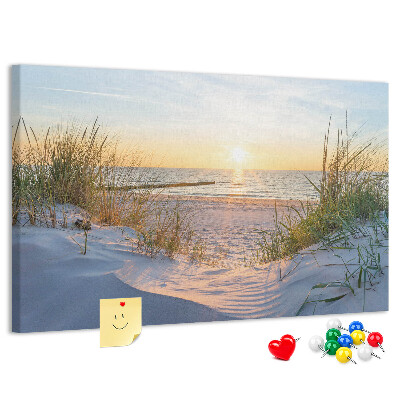 Tablero de anuncios Puesta de sol sobre la playa y las dunas.
