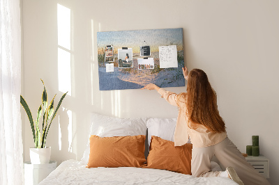 Tablero de anuncios Puesta de sol sobre la playa y las dunas.