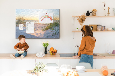 Tablero de anuncios Puesta de sol sobre la playa y las dunas.