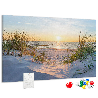 Tablero de anuncios Puesta de sol sobre la playa y las dunas.