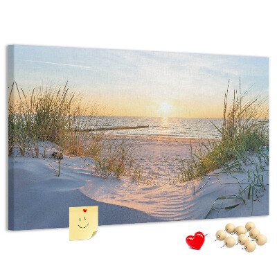 Tablero de anuncios Puesta de sol sobre la playa y las dunas.