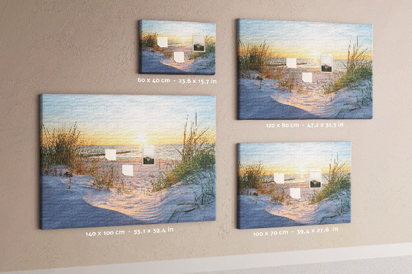 Tablero de anuncios Puesta de sol sobre la playa y las dunas.