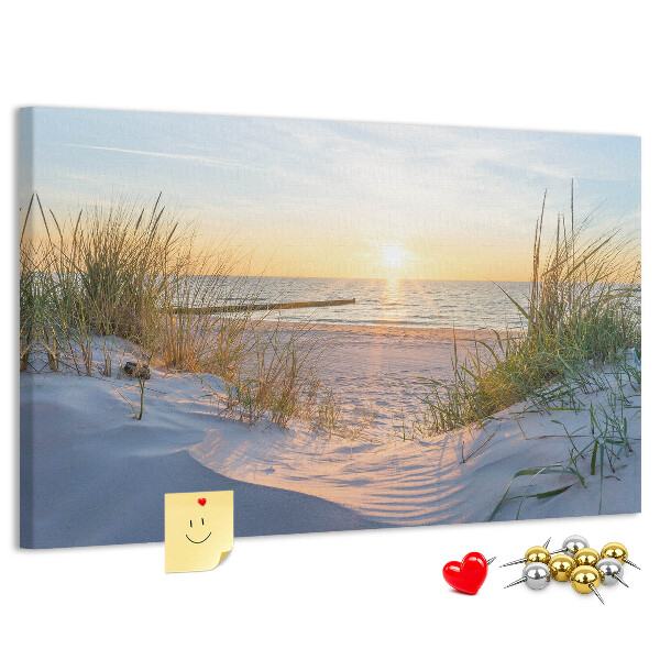 Tablero de anuncios Puesta de sol sobre la playa y las dunas.