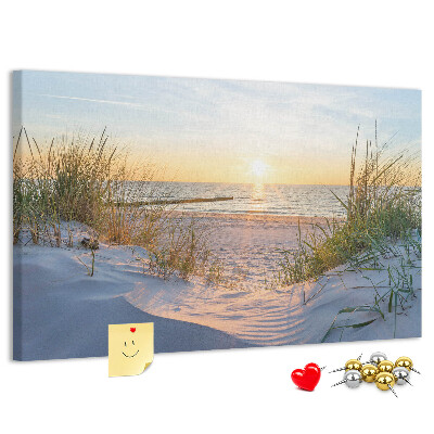 Tablero de anuncios Puesta de sol sobre la playa y las dunas.