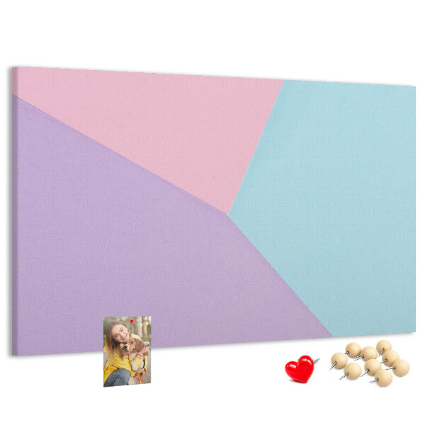 Pizarra de corcho con diseño de formas geométricas en colores pastel