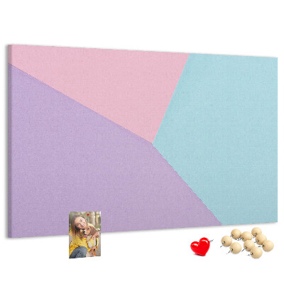 Pizarra de corcho con diseño de formas geométricas en colores pastel
