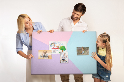 Pizarra de corcho con diseño de formas geométricas en colores pastel