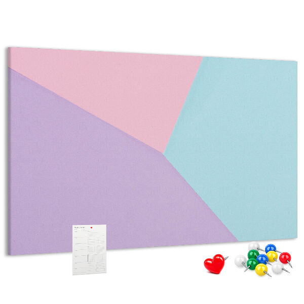 Pizarra de corcho con diseño de formas geométricas en colores pastel
