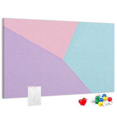Pizarra de corcho con diseño de formas geométricas en colores pastel