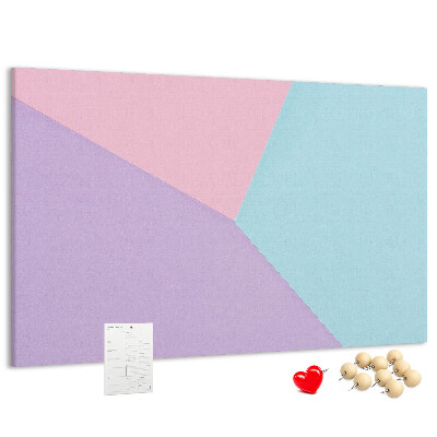 Pizarra de corcho con diseño de formas geométricas en colores pastel