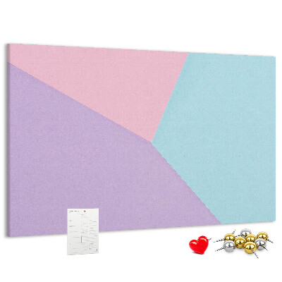 Pizarra de corcho con diseño de formas geométricas en colores pastel