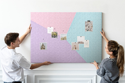 Pizarra de corcho con diseño de formas geométricas en colores pastel