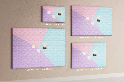 Pizarra de corcho con diseño de formas geométricas en colores pastel