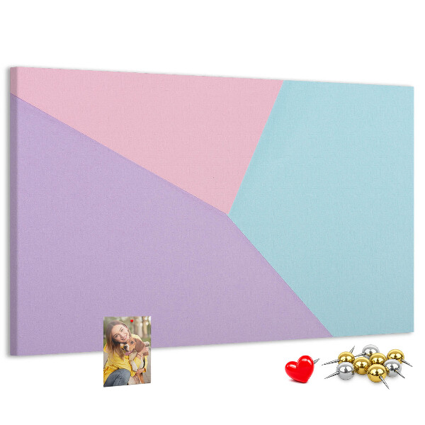 Pizarra de corcho con diseño de formas geométricas en colores pastel