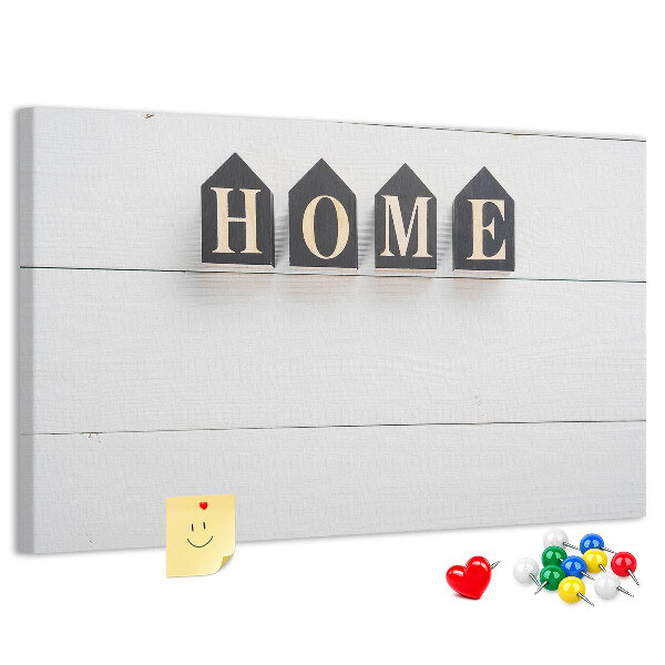 Tablero de corcho decorativo con letras elegantes sobre fondo de madera