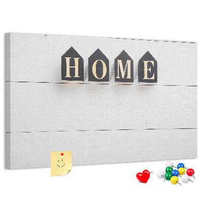 Tablero de corcho decorativo con letras elegantes sobre fondo de madera