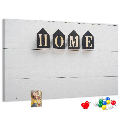 Tablero de corcho decorativo con letras elegantes sobre fondo de madera