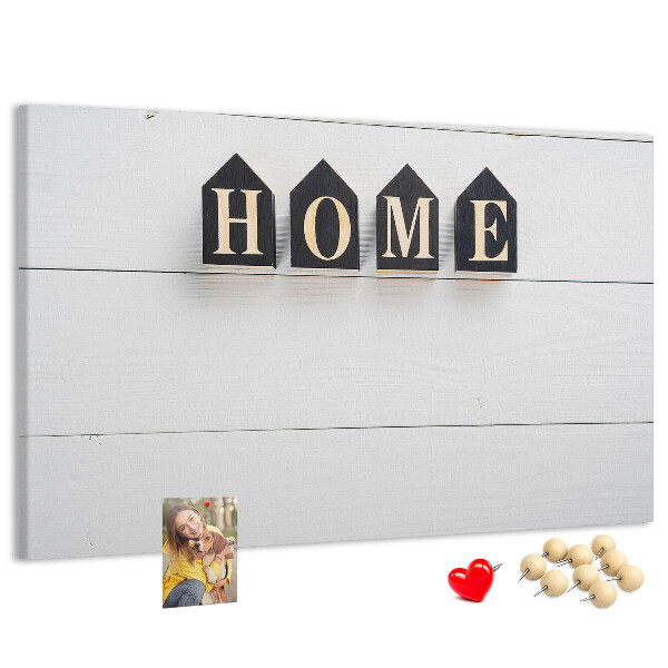 Tablero de corcho decorativo con letras elegantes sobre fondo de madera