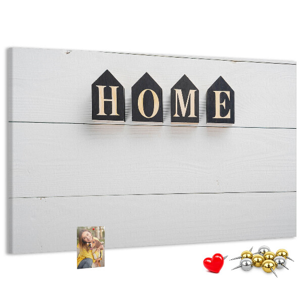 Tablero de corcho decorativo con letras elegantes sobre fondo de madera