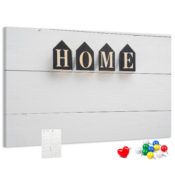 Tablero de corcho decorativo con letras elegantes sobre fondo de madera
