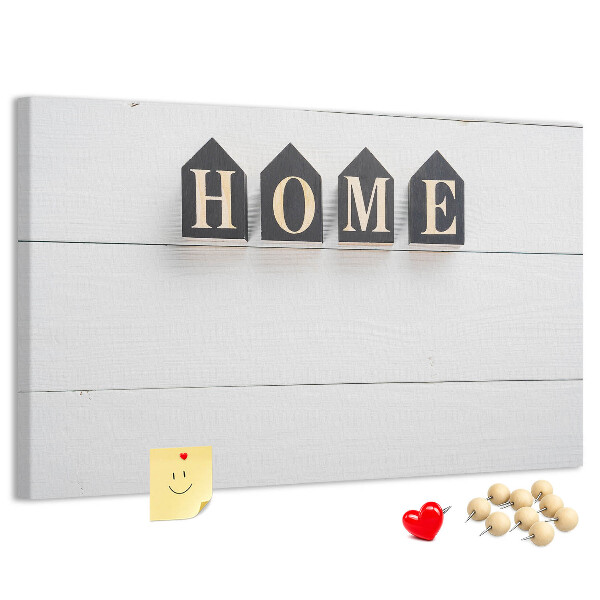 Tablero de corcho decorativo con letras elegantes sobre fondo de madera