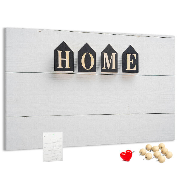 Tablero de corcho decorativo con letras elegantes sobre fondo de madera