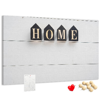 Tablero de corcho decorativo con letras elegantes sobre fondo de madera