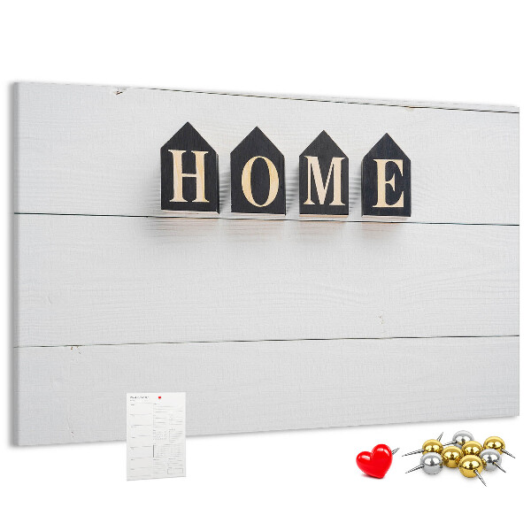 Tablero de corcho decorativo con letras elegantes sobre fondo de madera