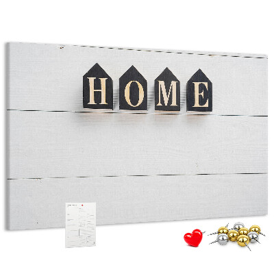 Tablero de corcho decorativo con letras elegantes sobre fondo de madera