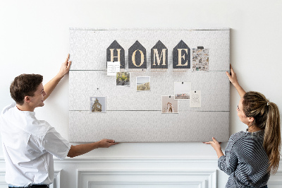 Tablero de corcho decorativo con letras elegantes sobre fondo de madera