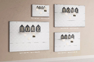 Tablero de corcho decorativo con letras elegantes sobre fondo de madera