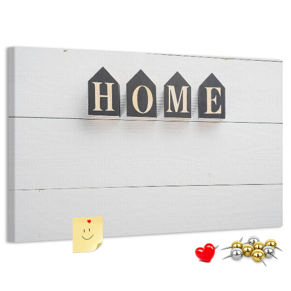 Tablero de corcho decorativo con letras elegantes sobre fondo de madera