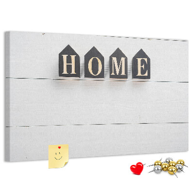 Tablero de corcho decorativo con letras elegantes sobre fondo de madera