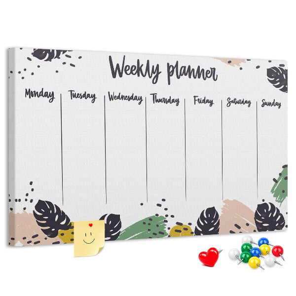 Pizarra de corcho con diseño de hojas tropicales para planificación semanal